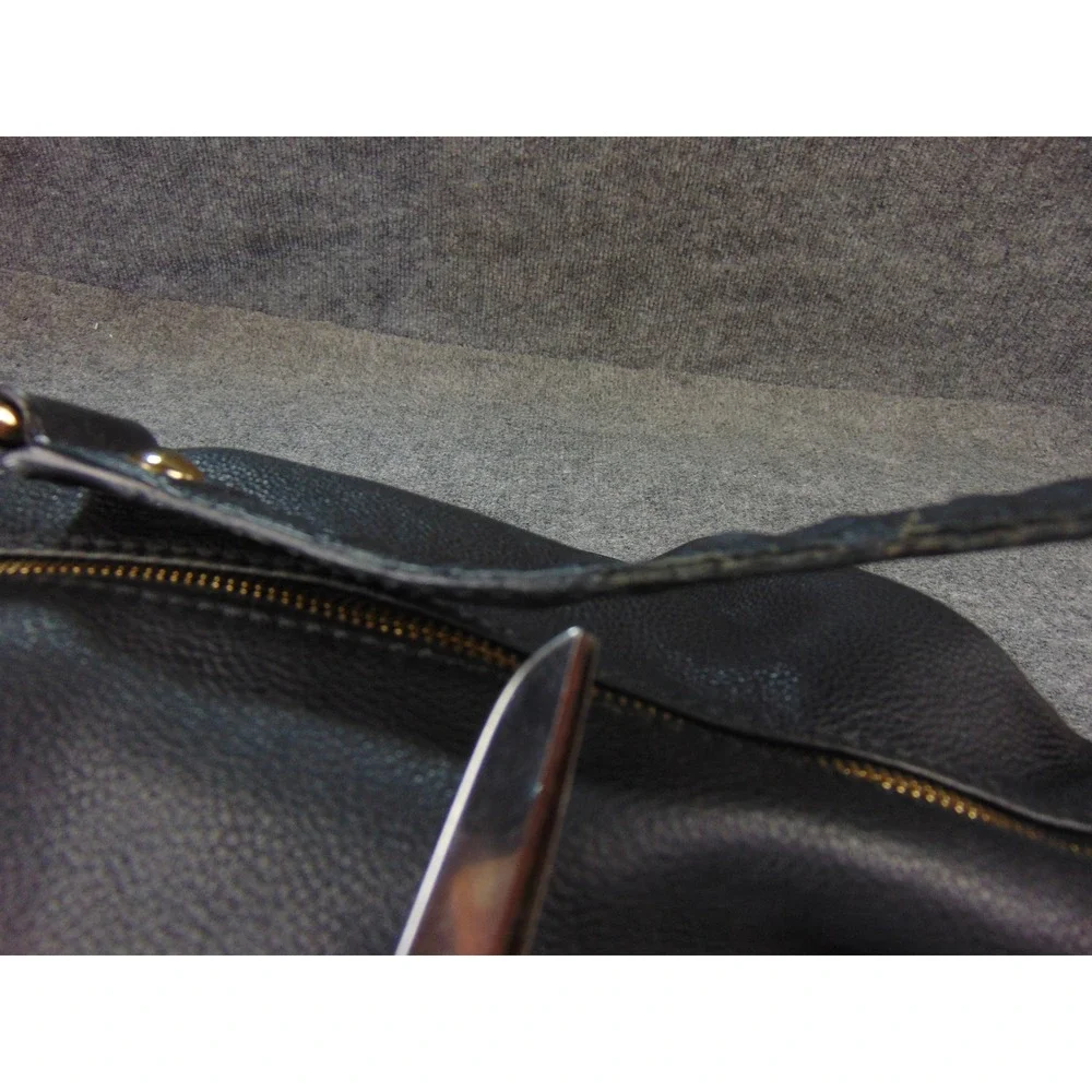 Michael Kors notice wear